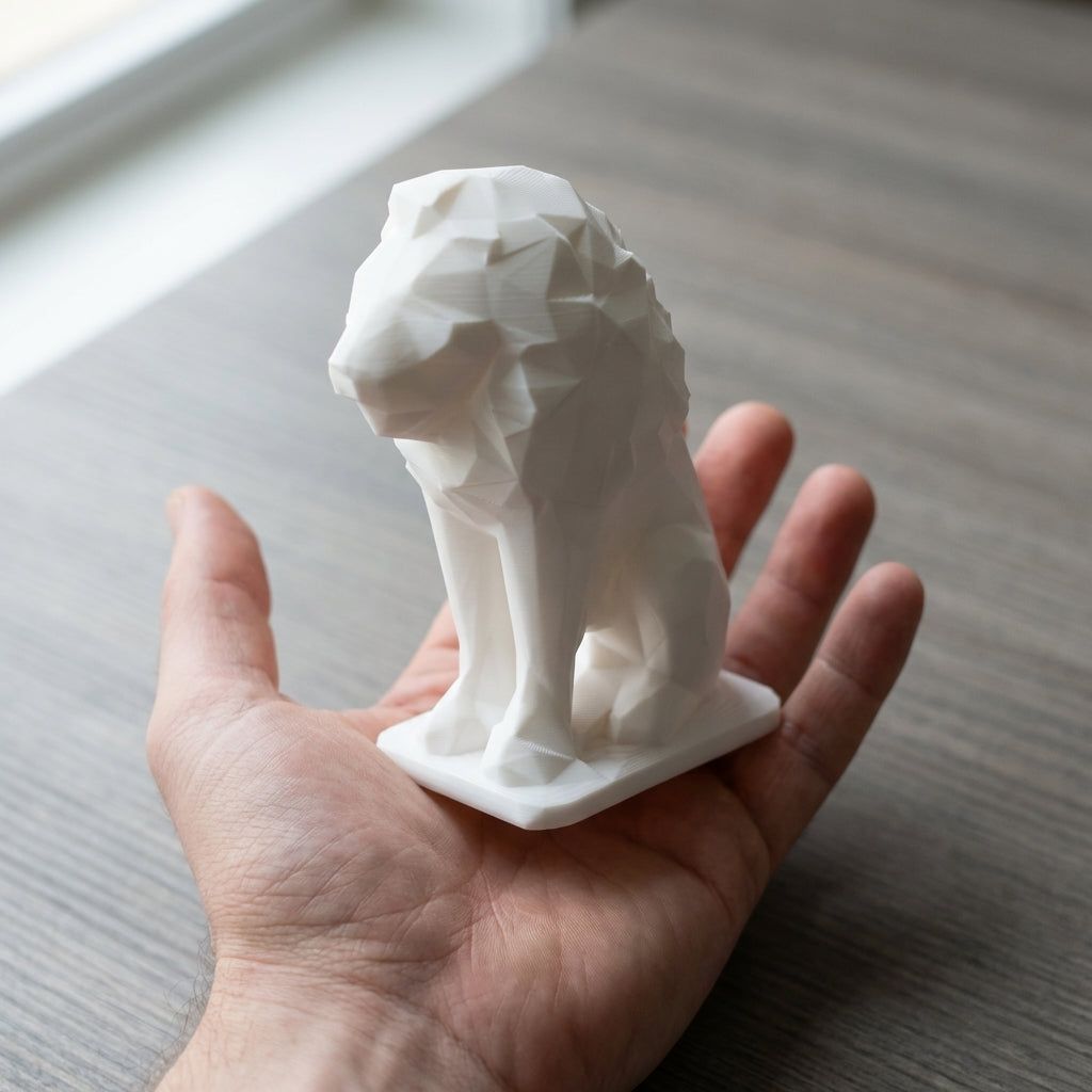 Lion held in hand showing real-world size (~10cm)